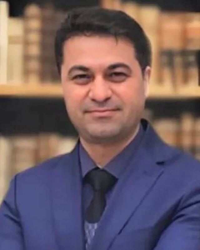 Portrait of Dr. Özcan Özbey